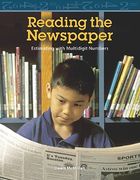 reading the newspaper