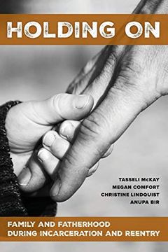 portada Holding on: Family and Fatherhood During Incarceration and Reentry (in English)