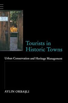 portada Tourists in Historic Towns: Urban Conservation and Heritage Management