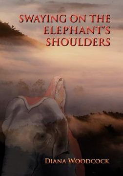 portada swaying on the elephant's shoulders (en Inglés)
