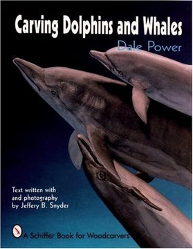 portada carving dolphins and whales
